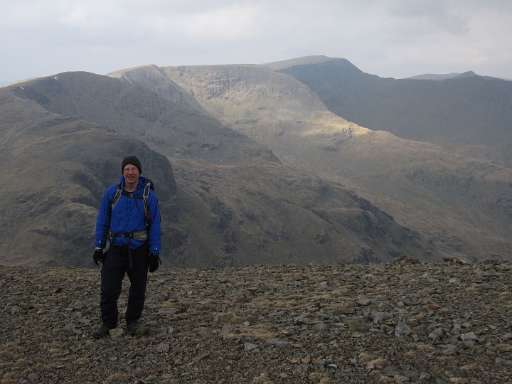 IMG_3213.JPG - Near the top of Fairfield.  Striding Edge is the horizontal ridge in the distance running up to the broad top of Helvellyn.  Is that Catstye Cam peaking up above the Edge?